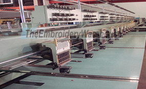 ID#1145 - Tajima TMEF-HCG912 Commercial Embroidery Machine. Year 1993 Heads: 12 Needles: 9 - www.TheEmbroideryWarehouse.com