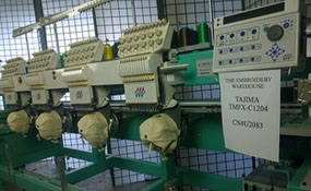 ID# 1198 1997 Tajima TMFX-C1204-S  Multi-head commercial embroidery machine http://www.TheEmbroideryWarehouse.com