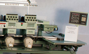 ID# 1288 1992 Tajima TME-HC912  Multi-head commercial embroidery machine http://www.TheEmbroideryWarehouse.com